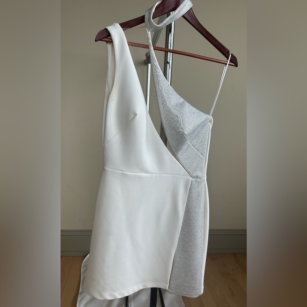 White dress with rhinestone throughout one side of dress